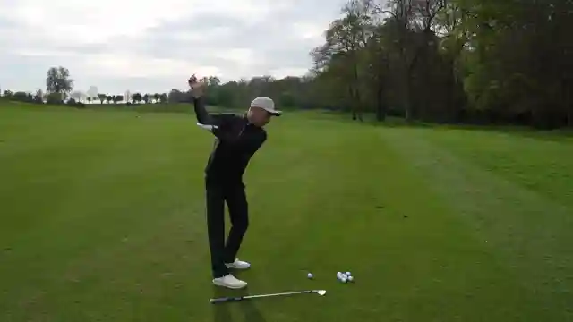 master-your-golf-swing-raise-arms-in-backswing-lower-in-downswing-for-consistency