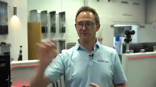 golf-ball-compression-impact-driver-vs-iron-performance-analysis